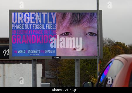 COP26 urgently phase out fossil fuels or slowly phase out the grandkids - The World is Looking to You COP26 electronic billboard, Glasgow, Scotland UK Stock Photo