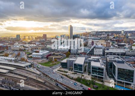 An aerial panorama view of Sheffield city centre and train station at sunset Stock Photo