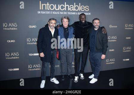 Eric Toledano, Francois Cluzet, Omar Sy and Olivier Nakache attending the 10th Anniversary of the Film Intouchables at the UGC Normandie cinema in Paris, France on November 15, 2021. Photo by Aurore Marechal/ABACAPRESS.COM Stock Photo
