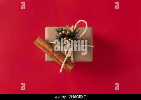 one gift box with paper and bow decorating in studio with pink background, detail of object for celebration Stock Photo