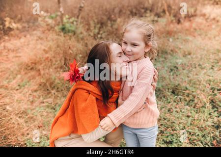 Mother And Daughter Hug and Expressing Love For Each Other Stock Photo