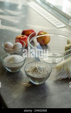 ingredients for apple pie in a transparent bowl Stock Photo