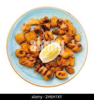 Spanish seafood dish battered fried baby squid Stock Photo