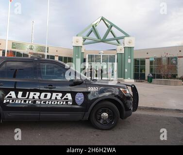 Denver, Colorado, USA. 15th Nov, 2021. Aurora Public School officers and Aurora Police keep watch in front of Aurora Central High School after the Nome Park Shooting across from High School in Aurora, CO this afternoon. 6 teens were shot ages 14 to 18 and all were hospitalized. (Credit Image: © Hector Acevedo/ZUMA Press Wire) Stock Photo
