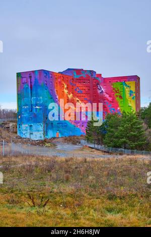 The former St Josephs Health Centre, Sudbury General Hospital, has been transformed into a giant mural of vibrant colours in hopes of uniting Canadian Stock Photo