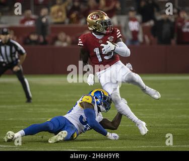 Santa Clara, United States. 16th Nov, 2021. San Francisco 49ers wide  receiver Deebo Samuel (19) takes a quarterback Jimmy Garoppolo pass past a  diving Los Angeles Rams safety Jordan Fuller (4) ifor