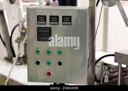 Control cabinet of an automated production line. Selective focus. Stock Photo