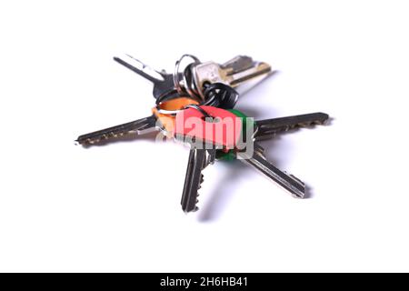 Bunch of keys on white background Stock Photo
