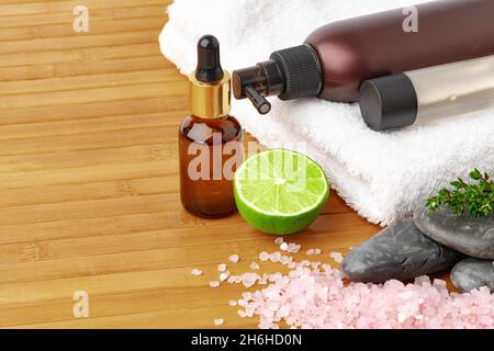 Beauty treatment items for spa procedures on wooden table Stock Photo