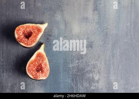 Fresh ripe figs on kitchen table. Top view. Stock Photo