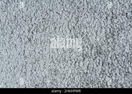 Carpet covering background. Pattern and texture of gray colour carpet. Copy space . High quality photo Stock Photo