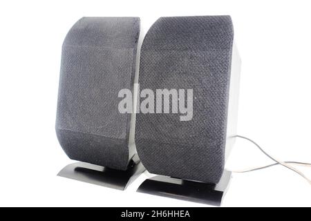 Two electric speakers on white background with selective focus Stock Photo