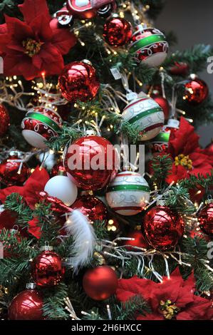 Christmas tree decoration in white and red colours in interior Stock Photo