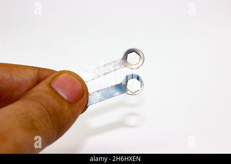 Geometry compass key isolated on white background with selective focus Stock Photo