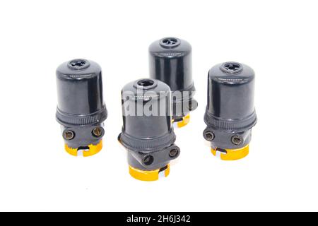 Bulb holders on white background with selective focus Stock Photo