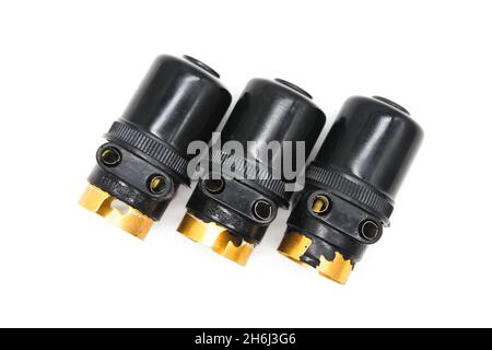 Bulb holders on white background with selective focus Stock Photo