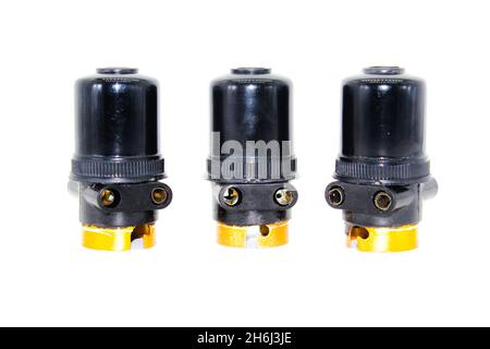 Bulb holders on white background with selective focus Stock Photo