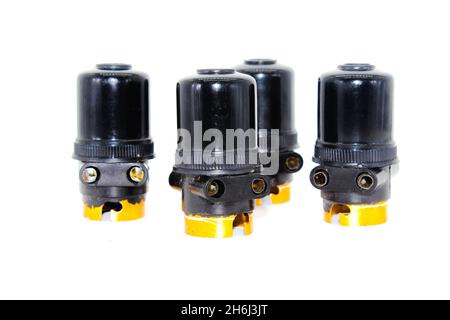 Bulb holders on white background with selective focus Stock Photo