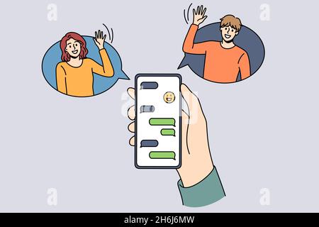 Online chat and technologies concept. Human hand holding smartphone with chat and smiling friends greeting from sides vector illustration  Stock Vector