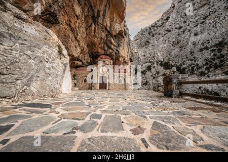 Orthodox chapel Agios Nikolaos nestled in rocks in Kotsifou canyon, Crete island, Greek Islands, Greece, Europe Stock Photo