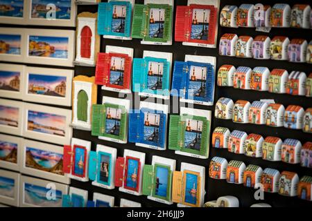 Hand craft magnet souvenirs for tourists in the shops of Chania old town, Crete, Greek Islands, Greece, Europe Stock Photo