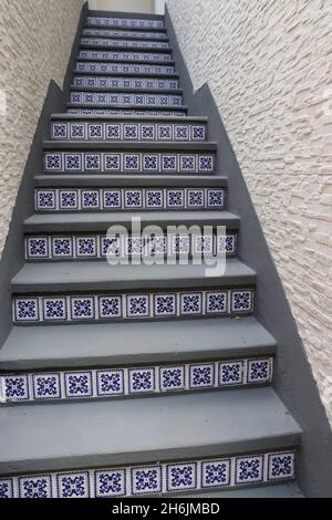 Staircase, outdoors, made of cement and decorated with Portuguese tiles. Stock Photo