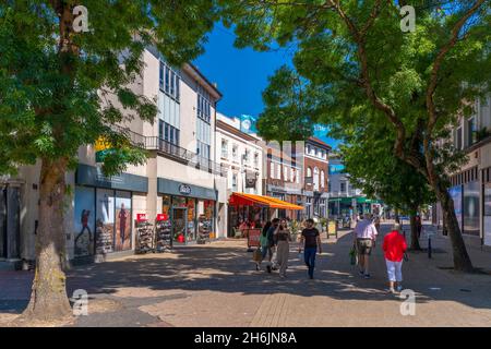 View of shops and cafes in Eastbourne town centre, Eastbourne, East Sussex, England, United Kingdom, Europe Stock Photo
