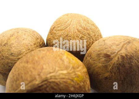 Coconuts on white background with selective focus Stock Photo