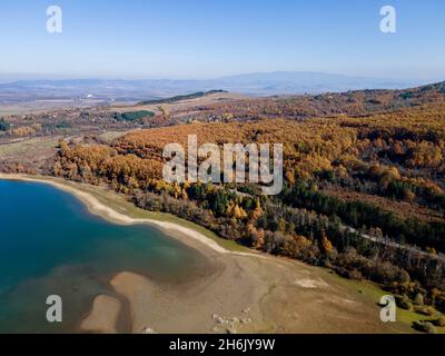 Aerial Autumn view of Izvor Reservoir at Konyavska Mountain, Pernik region, Bulgaria Stock Photo