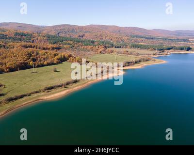 Aerial Autumn view of Izvor Reservoir at Konyavska Mountain, Pernik region, Bulgaria Stock Photo