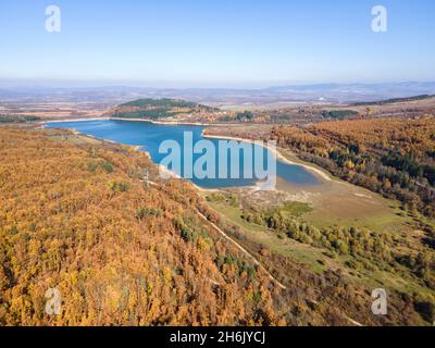 Aerial Autumn view of Izvor Reservoir at Konyavska Mountain, Pernik region, Bulgaria Stock Photo