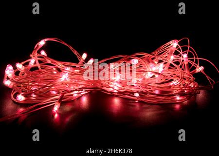 Light bulbs on dark background with selective focus Stock Photo