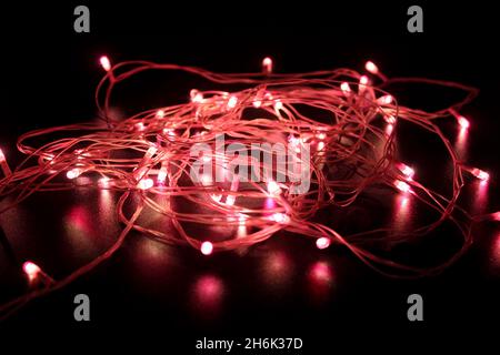 Light bulbs on dark background with selective focus Stock Photo