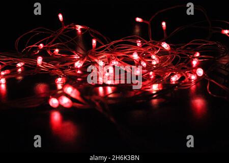 Light bulbs on dark background with selective focus Stock Photo