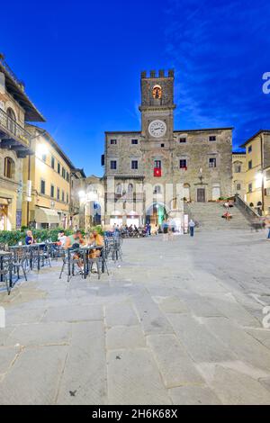 Cortona Arezzo Tuscany Italy. Palazzo del Popolo in Piazza della Repubblica at sunset Stock Photo