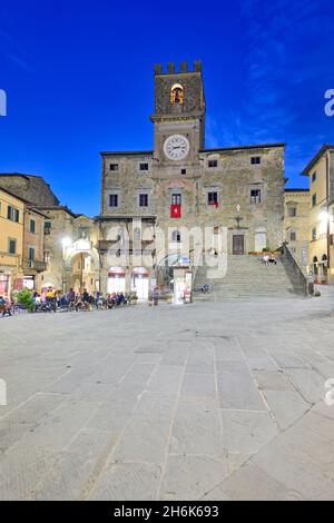 Cortona Arezzo Tuscany Italy. Palazzo del Popolo in Piazza della Repubblica at sunset Stock Photo