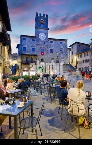 Cortona Arezzo Tuscany Italy. Palazzo del Popolo in Piazza della Repubblica at sunset Stock Photo