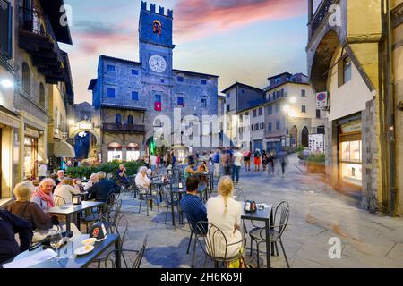 Cortona Arezzo Tuscany Italy. Palazzo del Popolo in Piazza della Repubblica at sunset Stock Photo