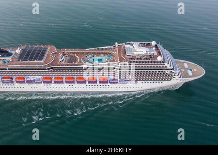 Aerial view of MSC Magnifica part of MSC Cruises arriving at Southampton port early morning. Stock Photo