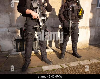 London, UK. 16th Nov, 2021. Armed police patrol in Westminster. The UK terror alert has been raised to ‘severe' following the taxi bomb in Liverpool on Remembrance Sunday and the recent death of Conservative MP David Amess. Credit: Mark Thomas/Alamy Live News Stock Photo