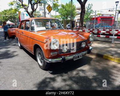 BUENOS AIRES, ARGENTINA - Nov 08, 2021: brown Peugeot 404 sedan popular French family car 1960-1975 noted for economy, comfort and durability. Expo Wa Stock Photo