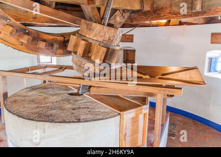 Milling mechanism of a windmill located in Consuegra village, Spain Stock Photo
