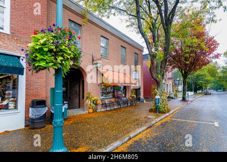 Brown awning above the shopfront of local deli 'The Village Butcher' in Woodstock, Vermont, New England, USA Stock Photo