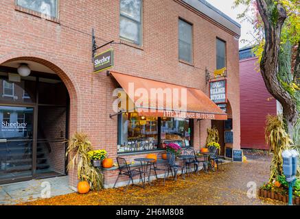 Brown awning above the shopfront of local deli 'The Village Butcher' in Woodstock, Vermont, New England, USA Stock Photo