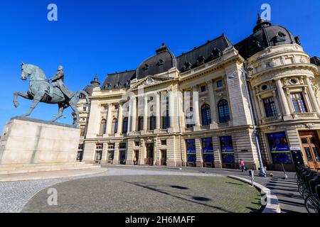 Bucharest, Romania, 8 November 2020: The main building of the Central University Library with equestrian monument to King Karol I in front of it in Ca Stock Photo