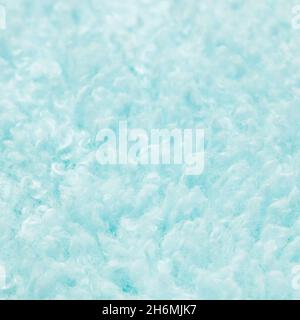 Texture of light blue artificial fur close up. Home decor and comfort concept Stock Photo