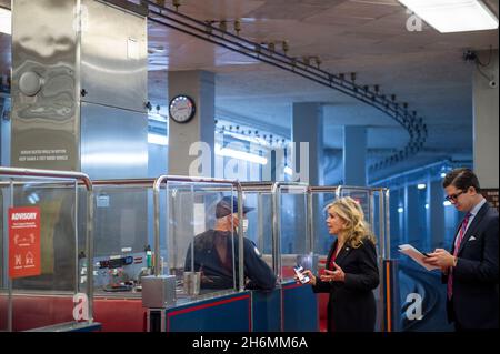 United States Senator Marsha Blackburn (Republican of Tennessee) talks with a Senate subway train operator as she arrives at the US Capitol during a vote in Washington, DC, Tuesday, November 16, 2021. Credit: Rod Lamkey/CNP Stock Photo