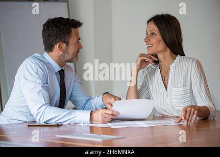 Businesspeople talking during meeting in office Stock Photo