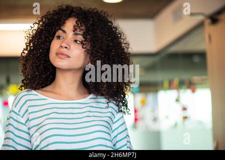Close-up of beautiful businesswoman standing in office Stock Photo