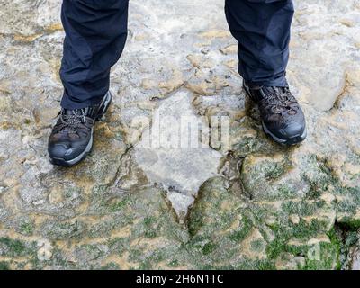 A Sauropod dinosaur footprint at An Corran beach, Staffin, on the Isle of Skye, Scotland, UK. Stock Photo